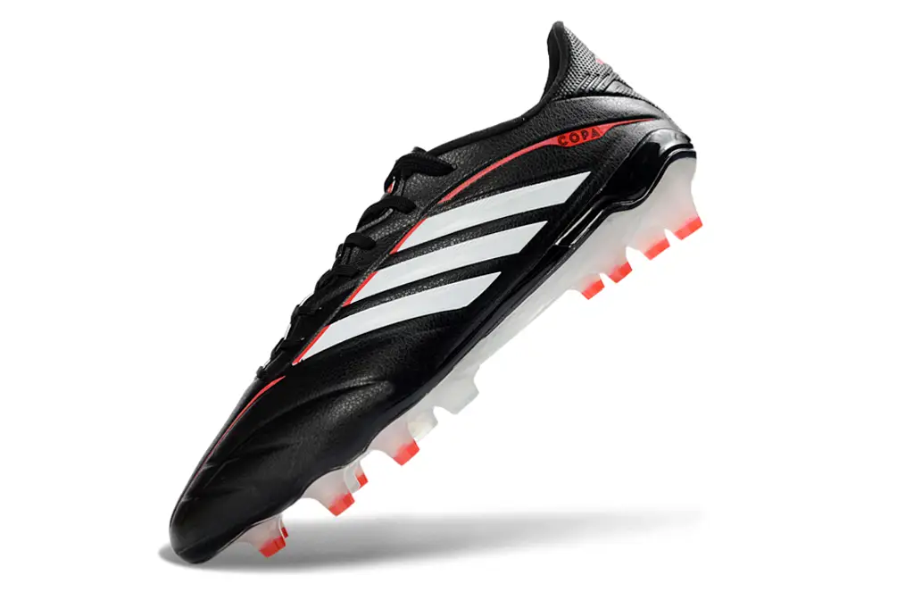 Close-up of Adidas Copa Pure IV Elite FG football with distinctive Pure Touch technology and Elite comfort